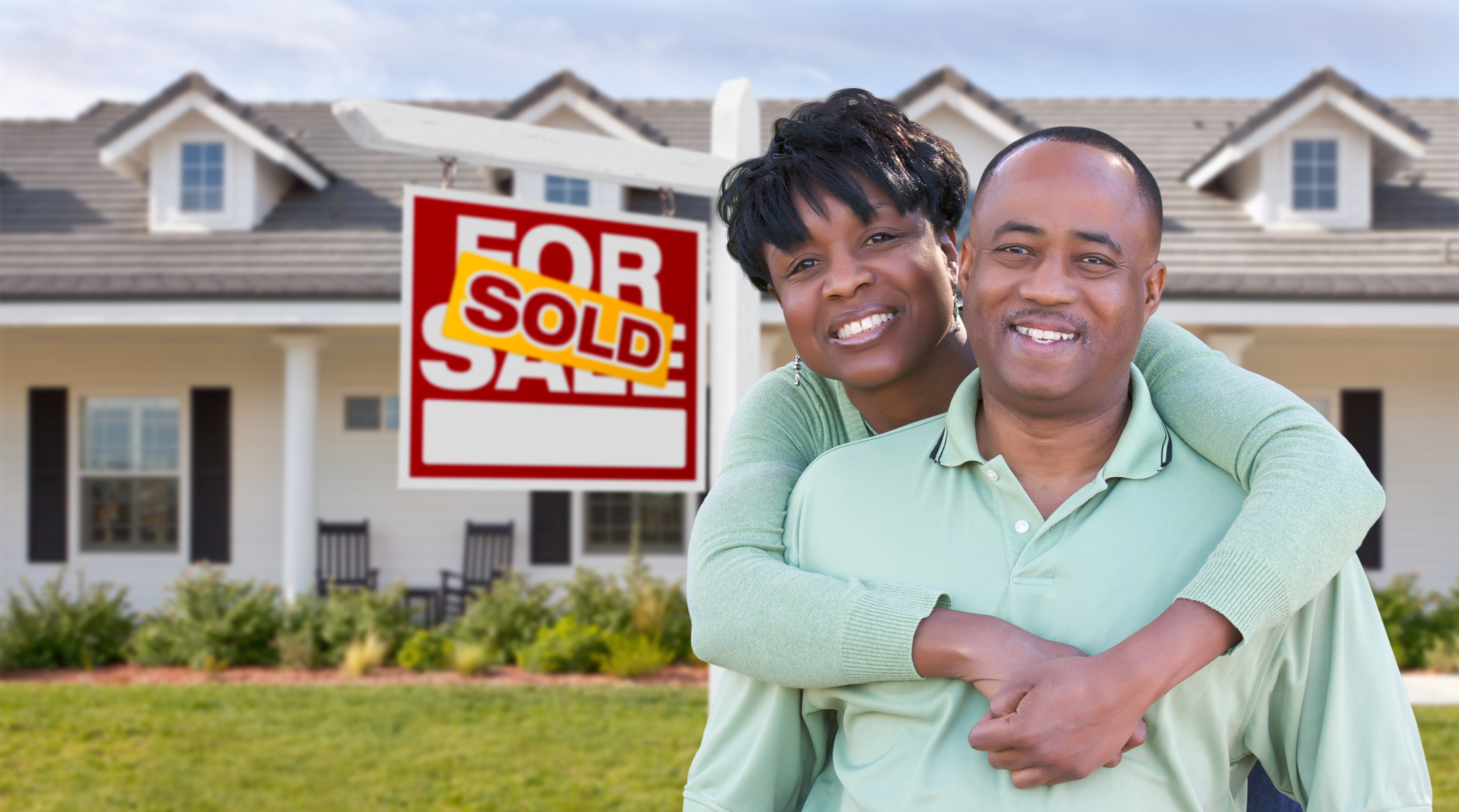 African American couple purchasing a home